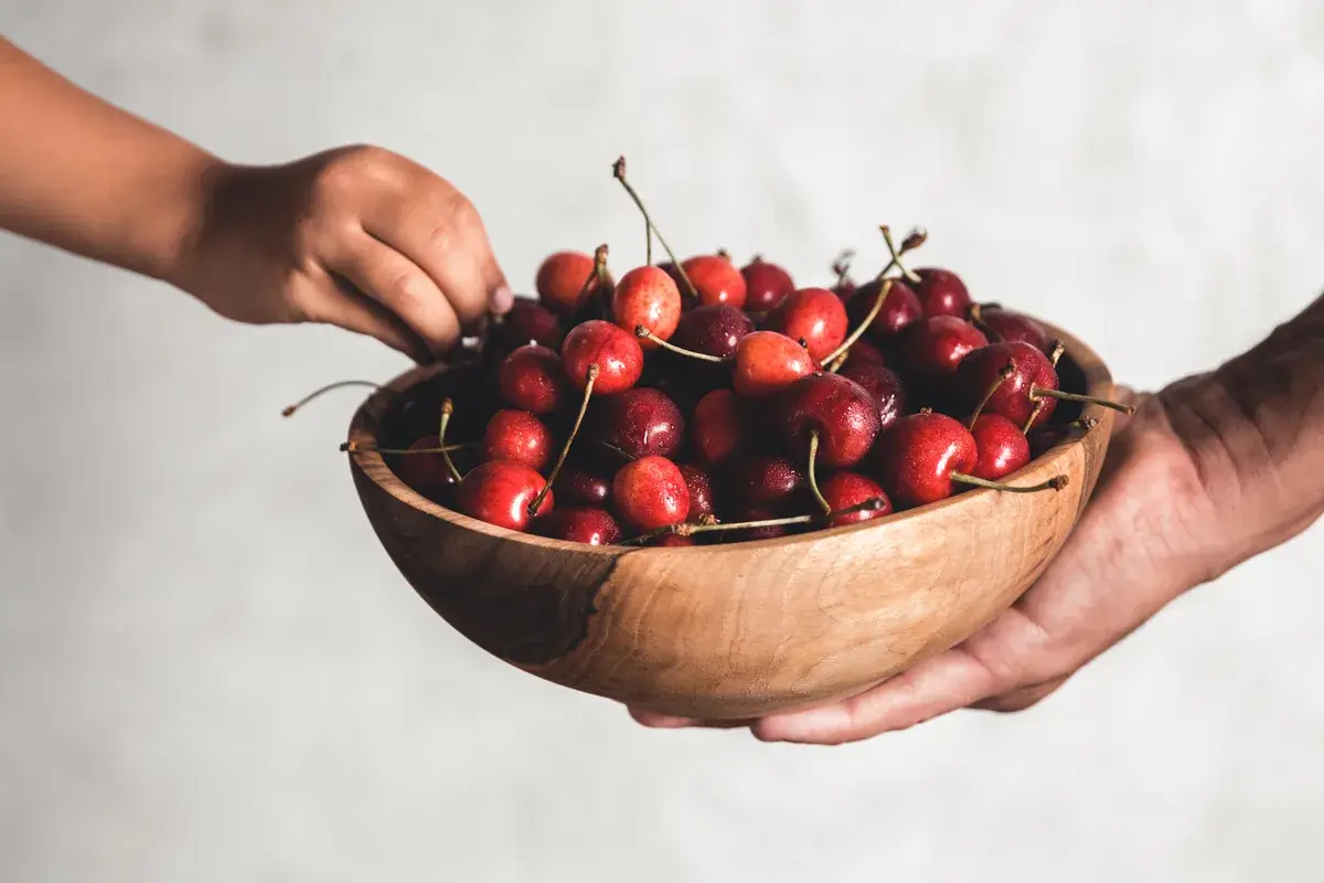 wooden-bowl-with-fresh-juicy-berries-cherries